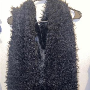 Black fur vest with hood